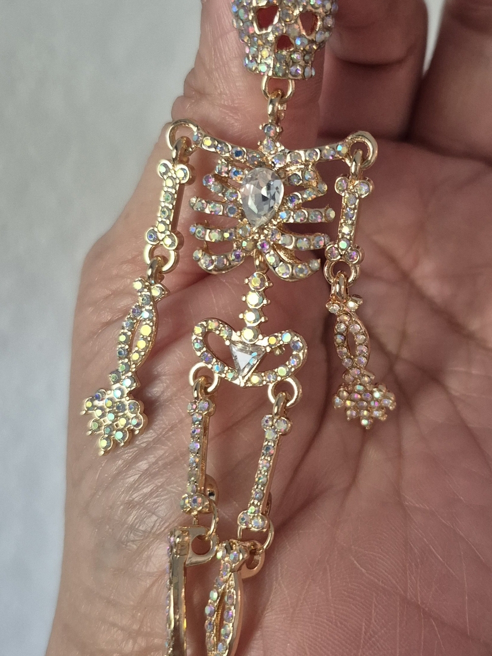 Gold Skeleton Dangle Earrings โ Halloween Crystal Rhinestone Skull Earrings